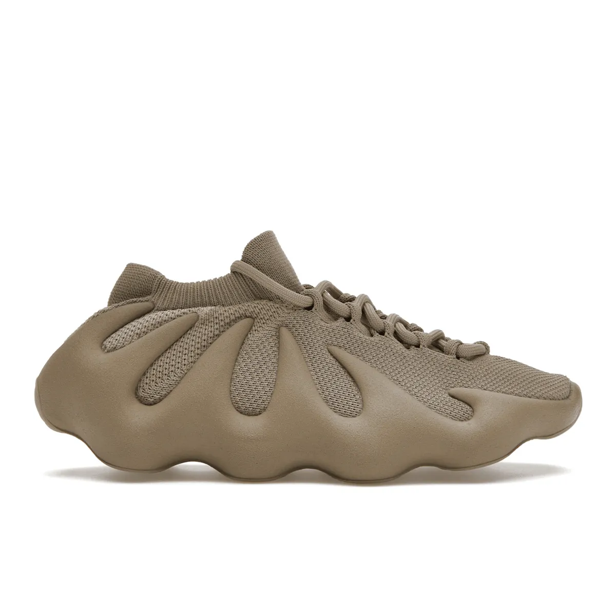 running in a bascule bridge area shoes left - foot Adidas Yeezy 450 Stone Flax