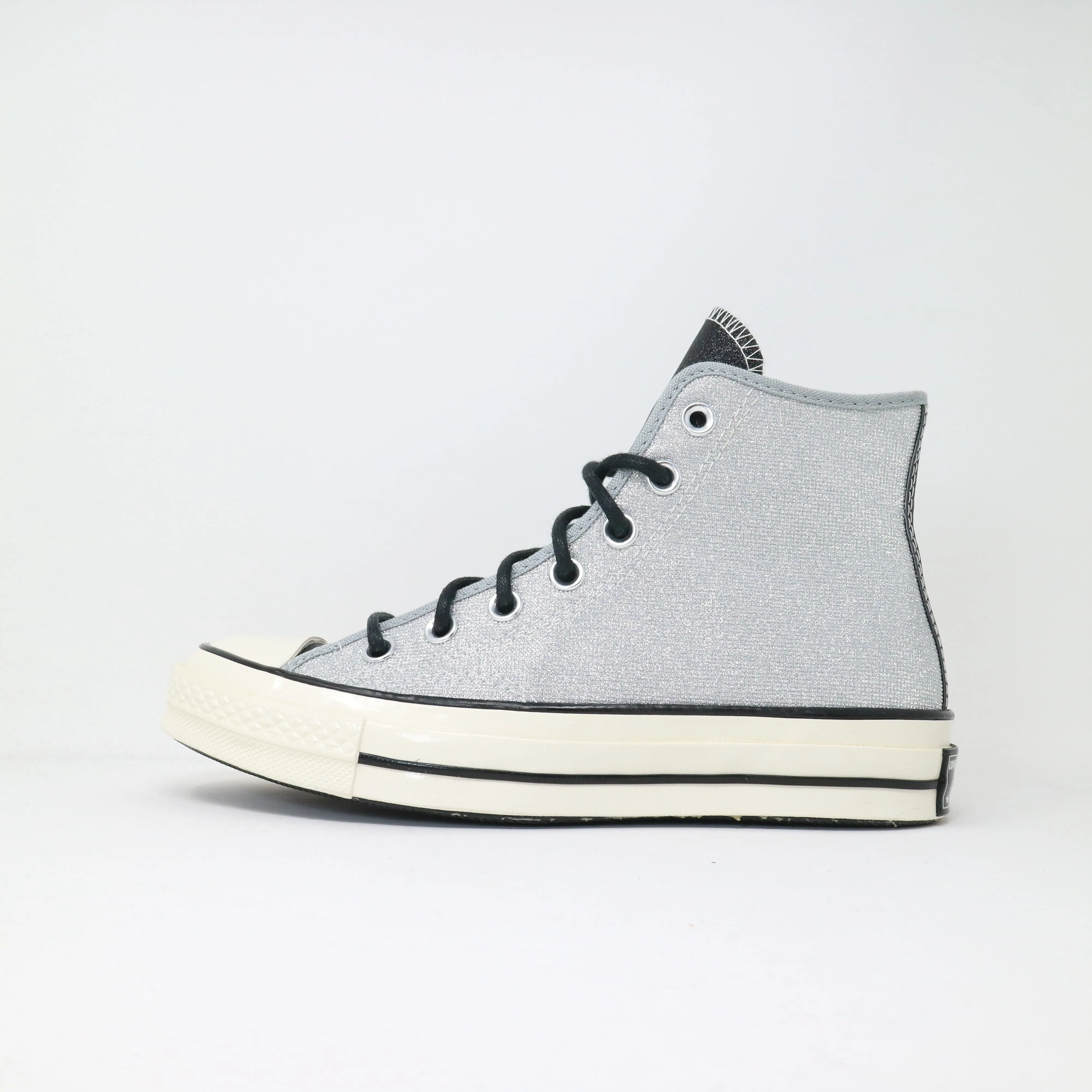 Women's Converse Chuck Taylor 70 All Star Hi - Silver Glitter Cushioned Insole running in a ferry terminal area shoes