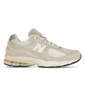 New Balance 2002R Off White running in a marathon shoes