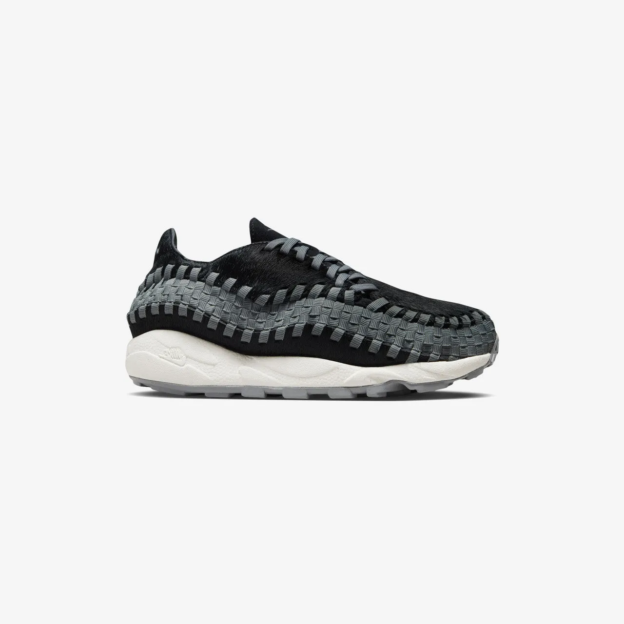 Wmns Air Footscape Woven Adaptive Motion