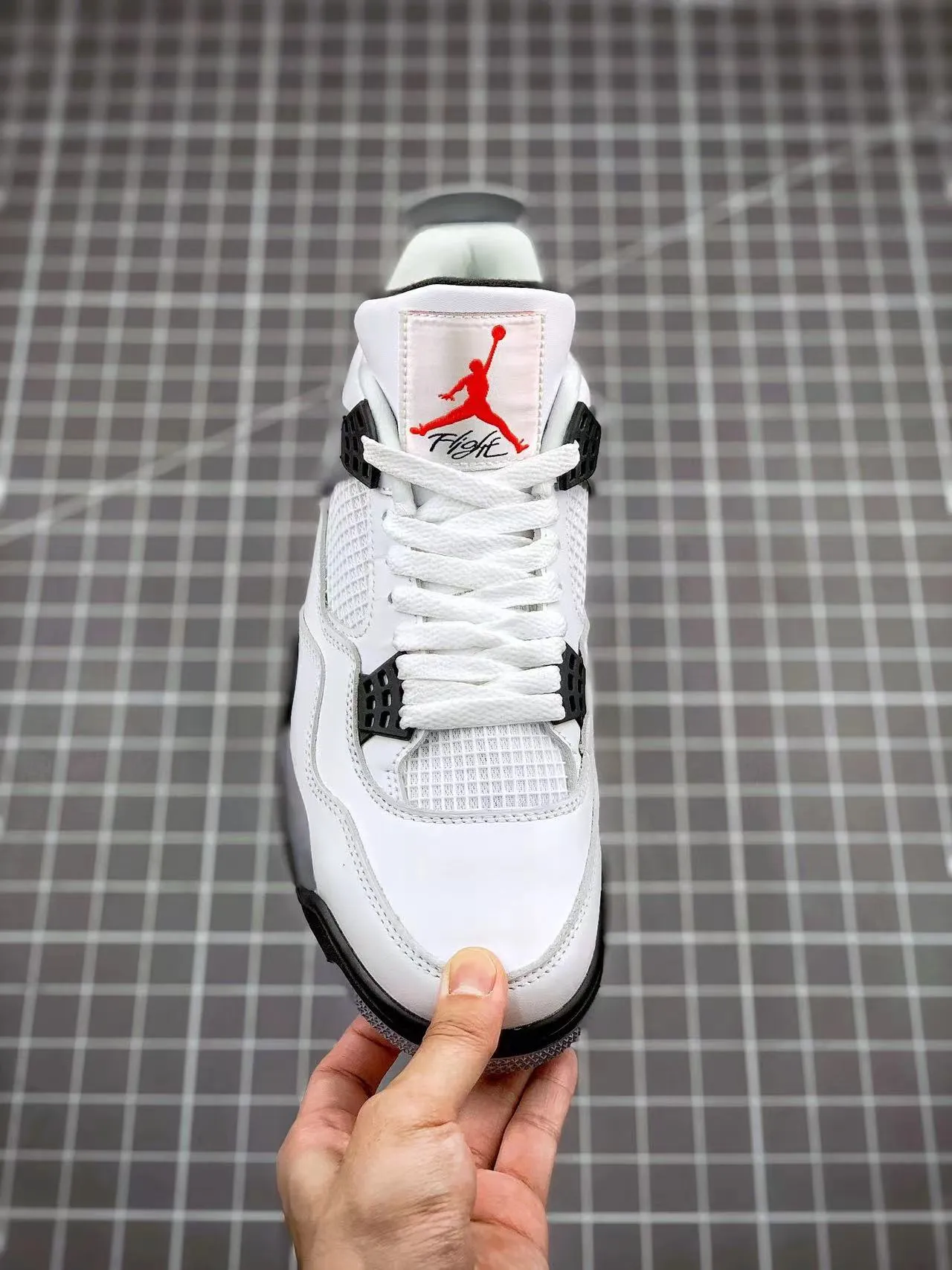 Fashion-Forward Look AJ 4 Retro White Cement