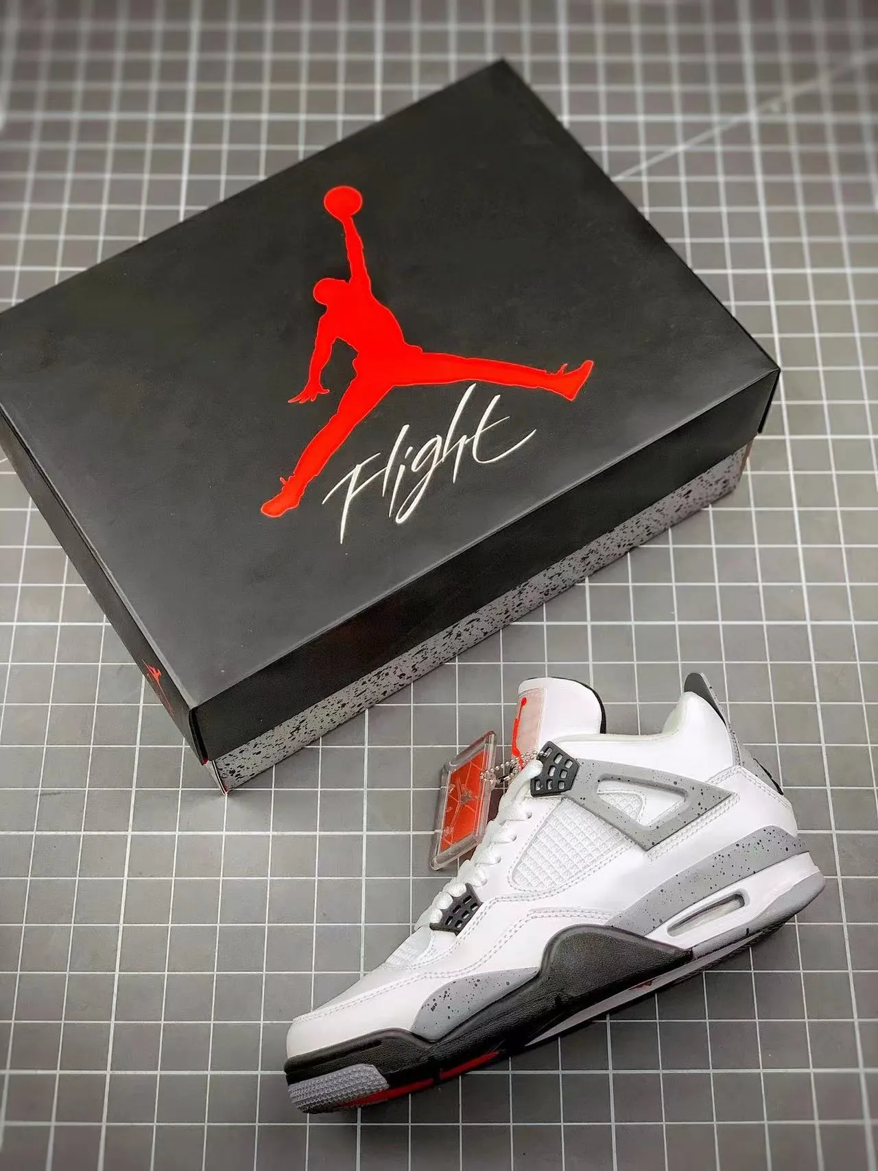 Fashion-Forward Look AJ 4 Retro White Cement