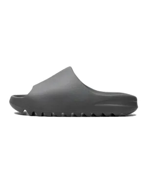 Yeezy Slide Slate Grey running in a ice field area shoes high - traction sole