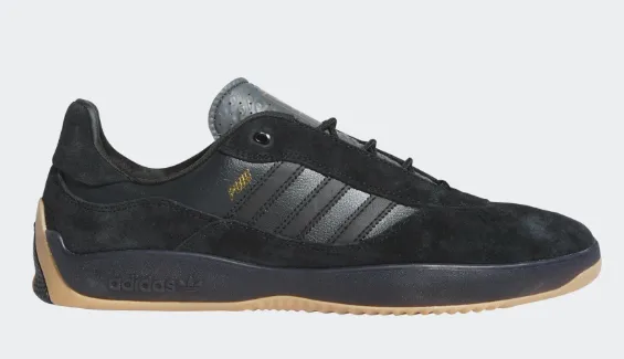 Luxuriously soft Adidas Puig Shoe - Core Black/Carbon/Gold