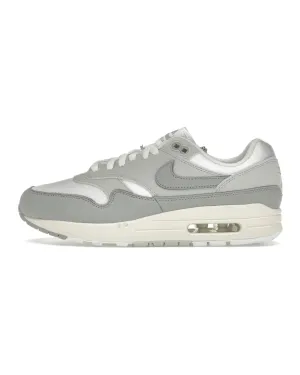 Nike Air Max 1 '87 Pure Platinum running in an airport area shoes