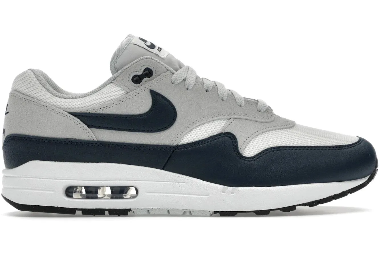 Nike Air Max 1 Essential Summit White Armory Navy running on concrete