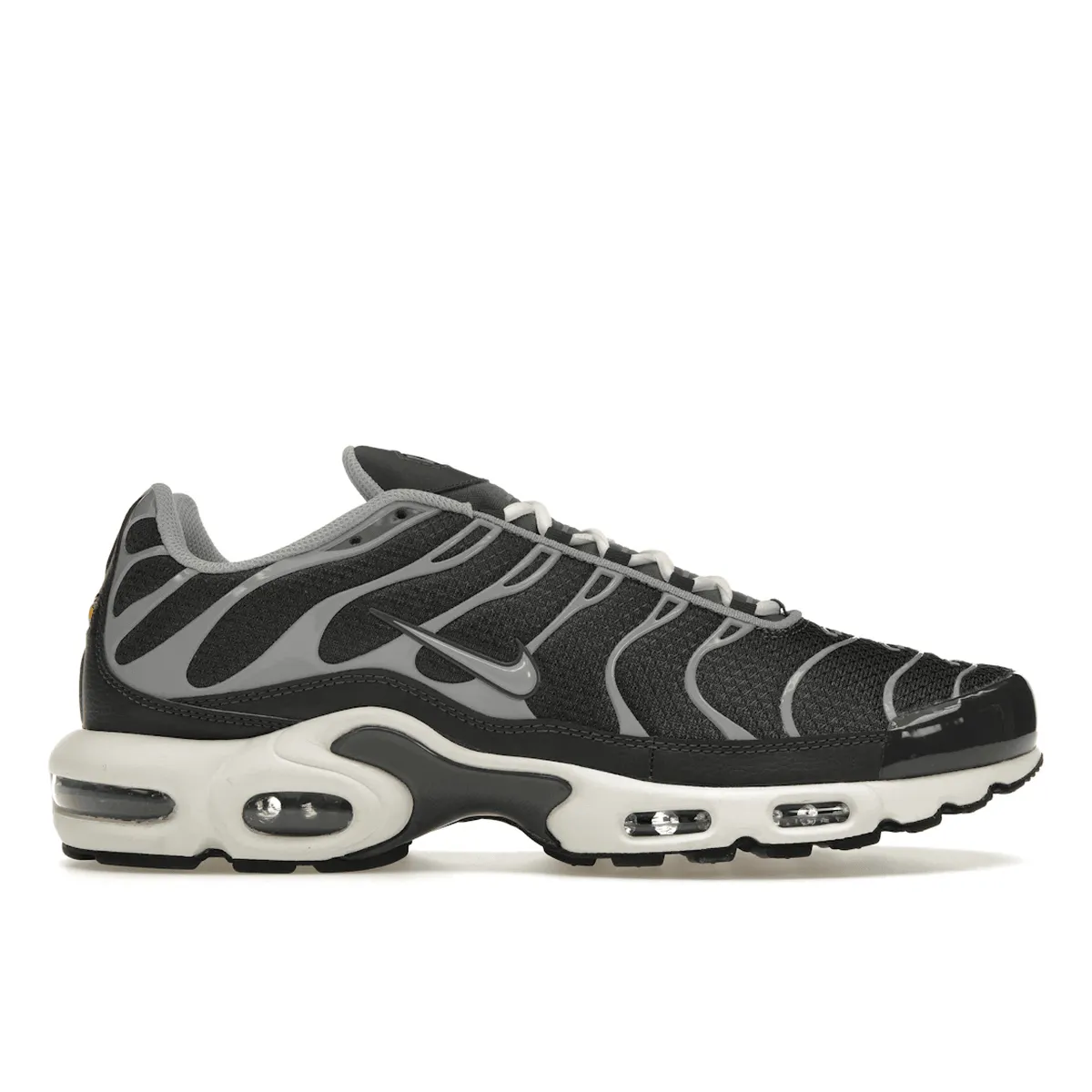 Nike Air Max Plus Greyscale Cool Grey running in an airport area shoes